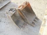 a large excavator that is sitting on the ground