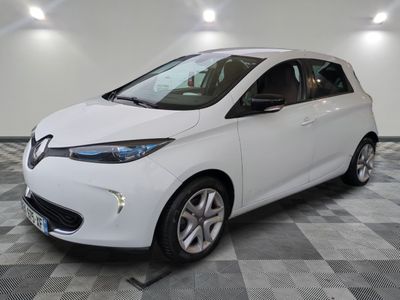 a picture of a white car parked in a garage