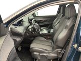 the interior of a car with the door open and the driver ' s seat down
