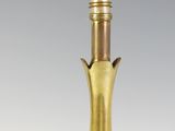 an image of a gold colored vase with a gold colored top