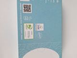 the back of a blue box with a white label on it