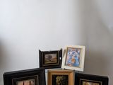 four framed pictures of a woman and a man