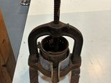 a small metal object on a table in a room