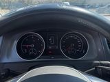 dashboard of a car with a steering wheel and gauges on it