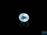 a close up of a blue moon on a black background