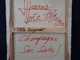 une photo d'une œuvre d'art sur laquelle figurent des inscriptions