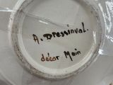 a close up of a vase with writing on it