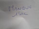 handwriting on a piece of white paper with blue writing on it