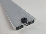 a close up of an aluminum profile on a white surface