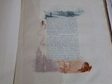 an old book with a picture of a ship on it