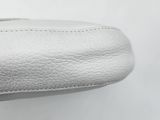 the inside of a pair of white shoes on a white surface