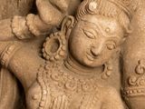 statue of a woman holding a baby in her arms