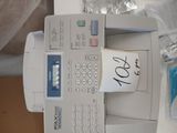 an image of a fax machine with a price tag attached to it