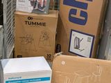 many boxes that are sitting on the ground next to each other