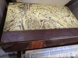 an old book sitting on top of a table