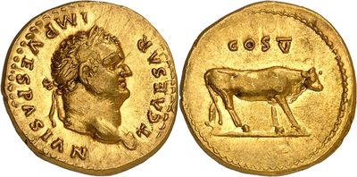a close up of a gold coin with a cow on it