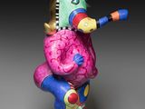 an image of a colorful sculpture of a person on a skateboard