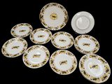 a lot of plates that are sitting on a table