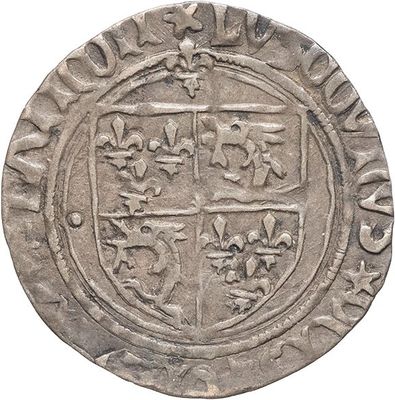 a close up of a coin with a coat of arms on it