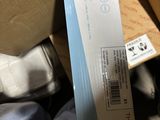 a box that is sitting on top of a bed