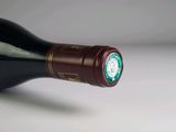 a bottle of wine that has a starbucks logo on it