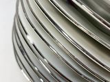 many plates stacked on top of each other on a table