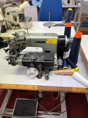 a sewing machine that is sitting on a table