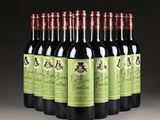six bottles of red wine are lined up in a row