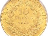 a close up of a gold coin with a wreath on it