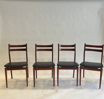 set of four danish dining chairs in teak and black leather