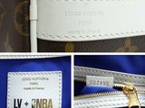 a close up of a louis vuitton bag with a label on it