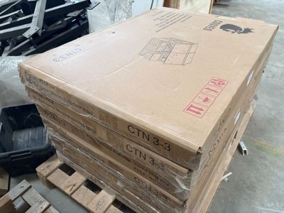 a stack of boxes sitting on a pallet in a warehouse
