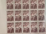 an image of a sheet of stamps with a picture of a man on a horse