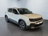 a white suv parked in a showroom with a white wall