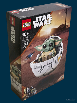 une boîte de jouets Lego Star Wars sur fond bleu