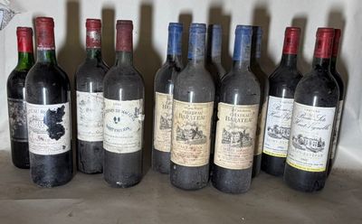 several bottles of wine are lined up in a row