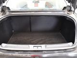 a trunk of a car with the back door open