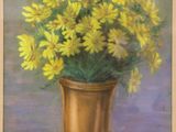 painting of yellow flowers in a gold vase on a table