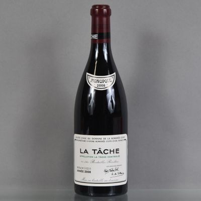 a bottle of wine that is sitting on a table