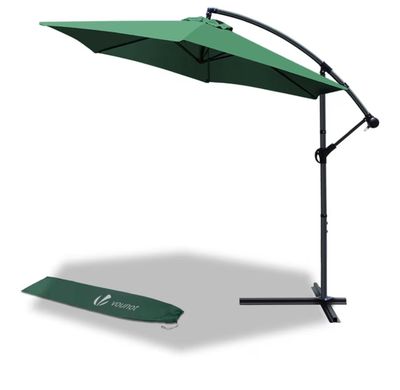 un parapluie vert avec un manche noir à côté