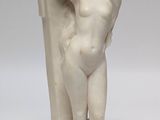 statue of a man holding a woman in his arms