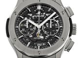 the watch is made of stainless steel and has a black dial