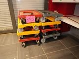 a cart that has a lot of wheels on it