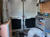 an image of a van with a bunch of stuff in it