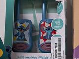 a box with a pair of scissors and a pair of scissors in it