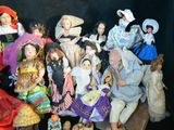 a lot of figurines that are sitting on a table
