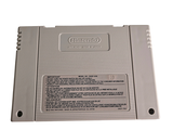 a nintendo game console sitting on top of a white table