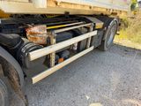 an image of a large truck with a bunch of items in the back
