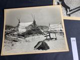 two old black and white photos of a man laying on the ground