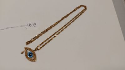 une image représentant un collier en or orné d'un « œil maléfique » bleu